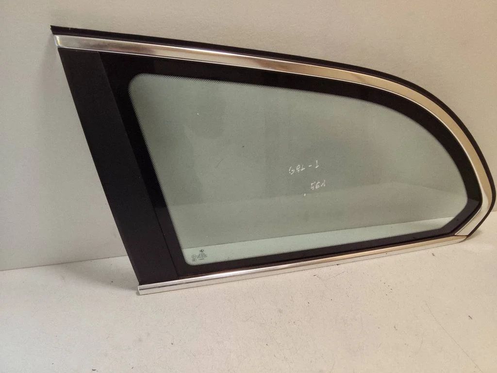 Rear side window – left