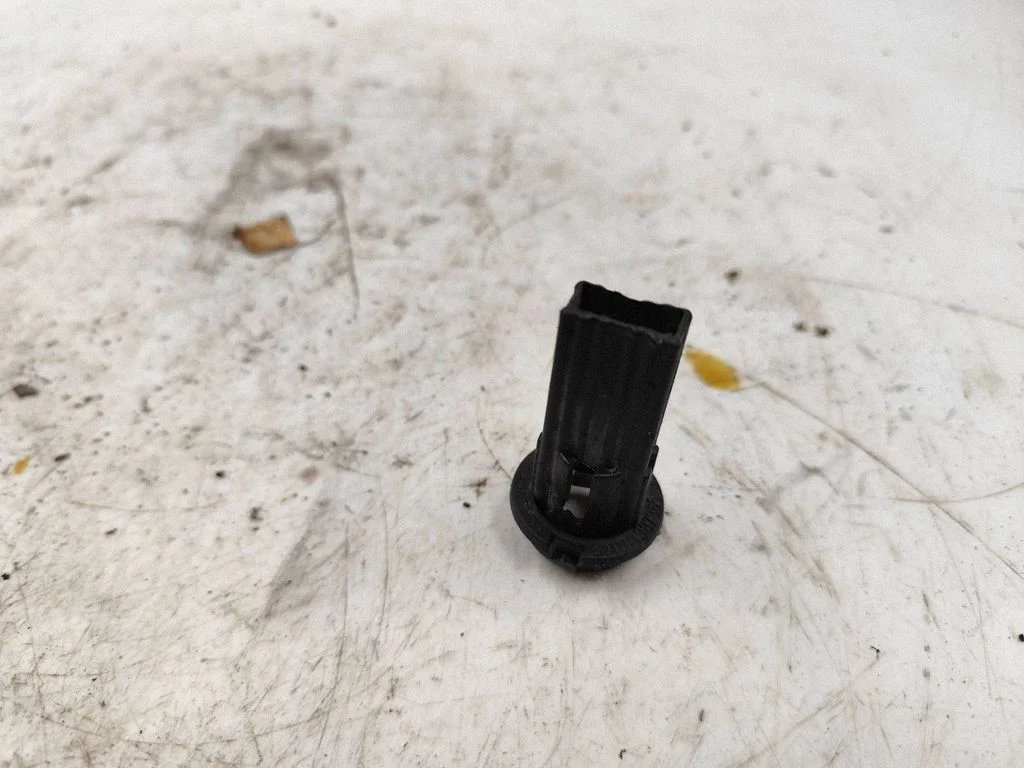 Priekinio žibinto detalė