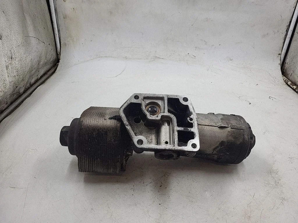 Oil filter mounting bracket 045115389J