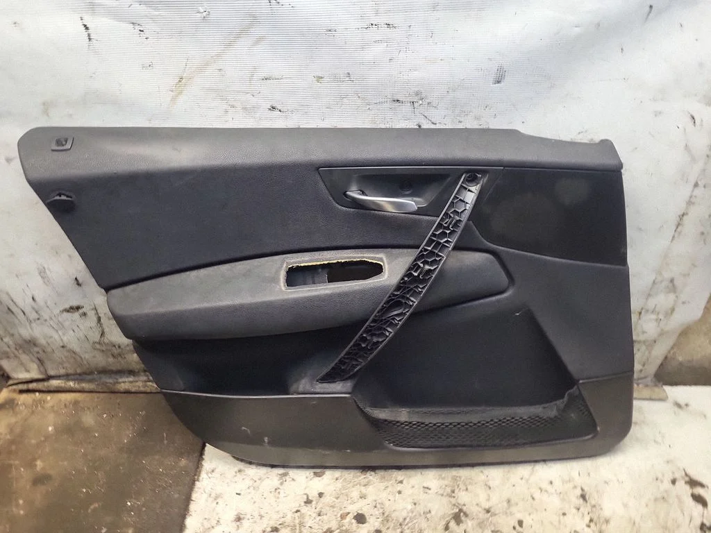Front door card panel trim – front left