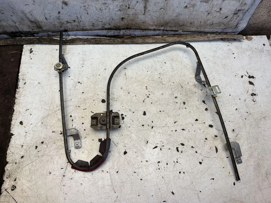 Mechaninis lango pakėlimo mechanizmas