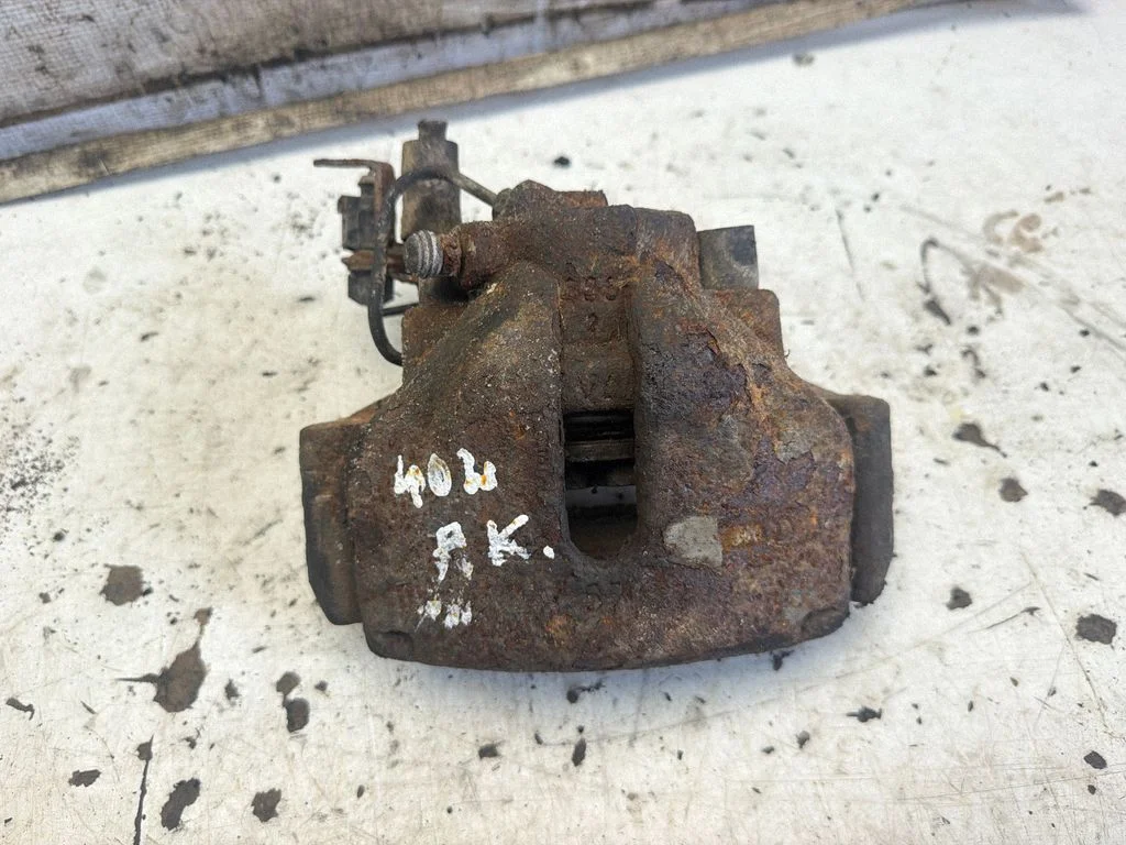 Front brake caliper – front left