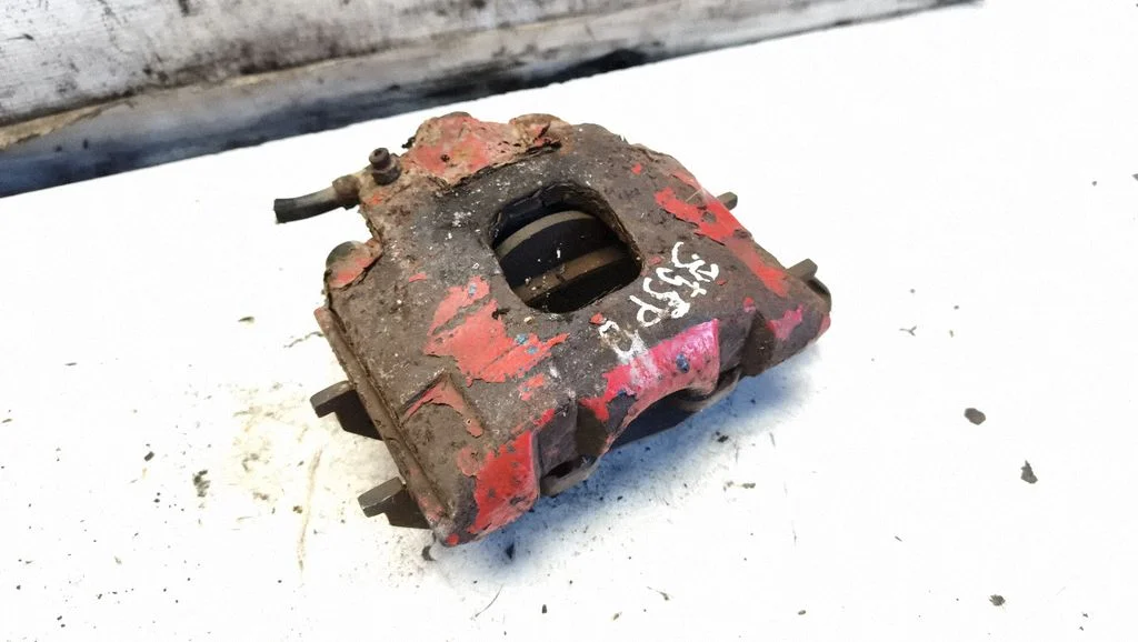 Front brake caliper – front right