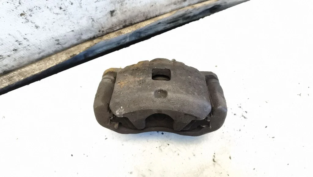 Front brake caliper – front left