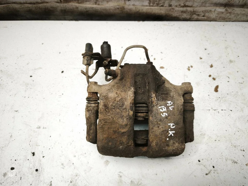 Front brake caliper – front left