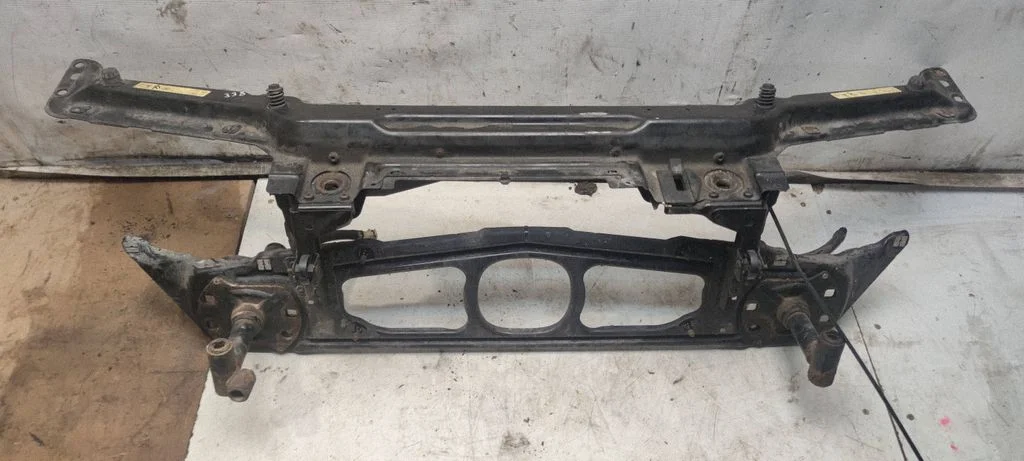 Radiator support slam panel