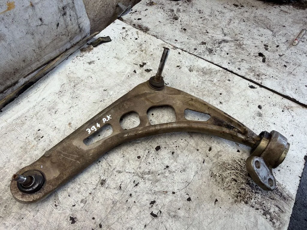 Front lower control arm/wishbone – front left