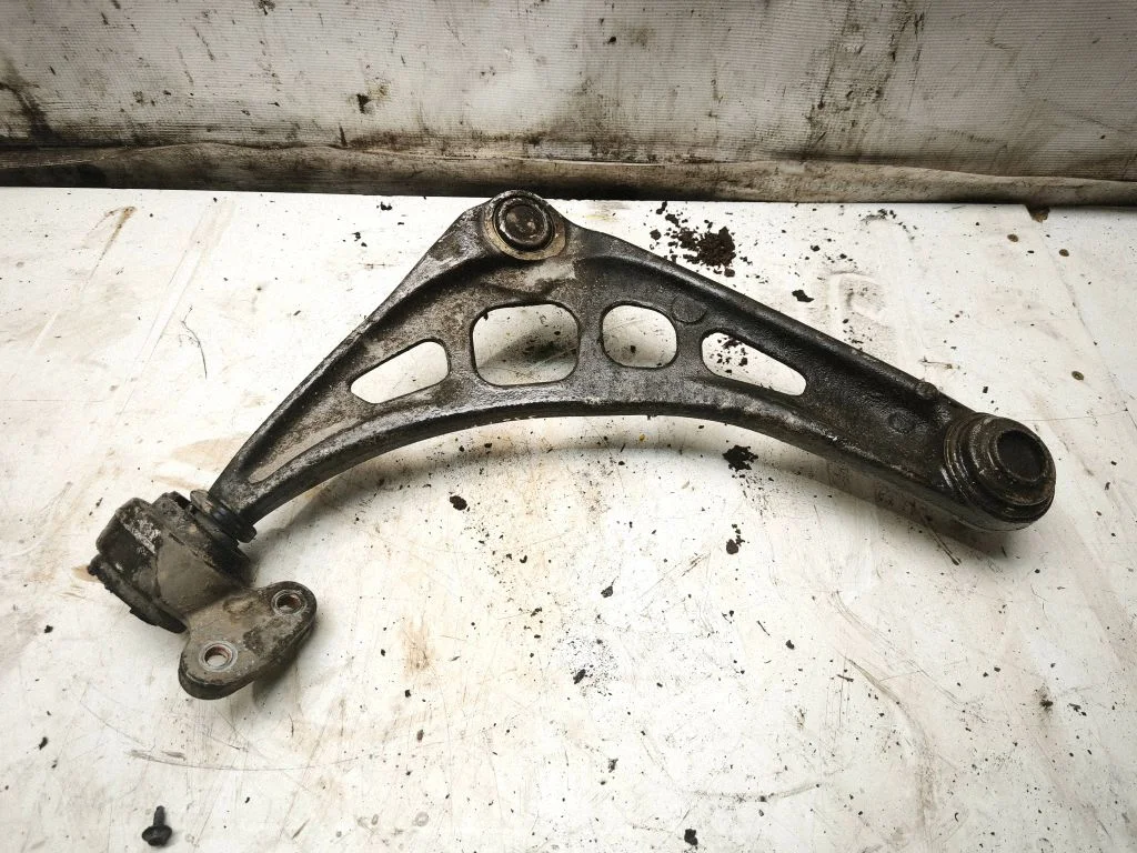Front lower control arm/wishbone – front left