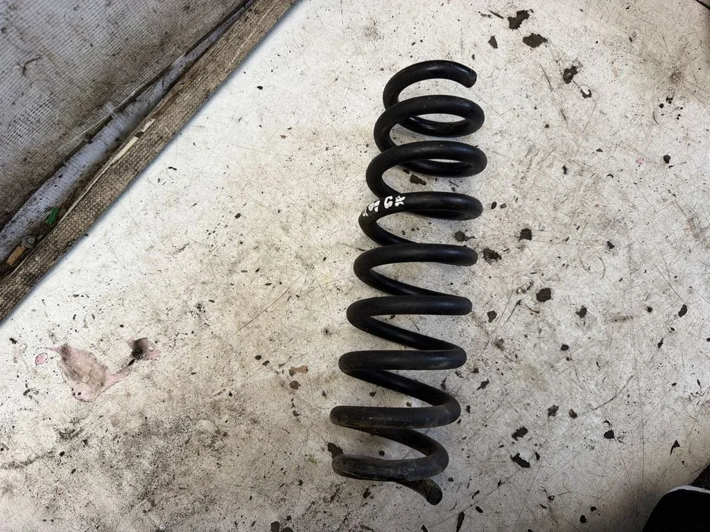 Rear coil spring – rear left