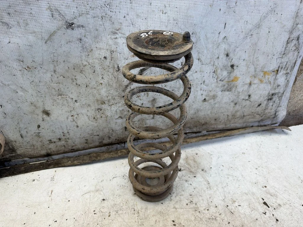 Rear coil spring – rear right