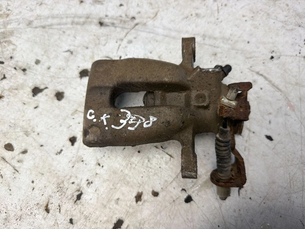 Rear brake caliper – rear left