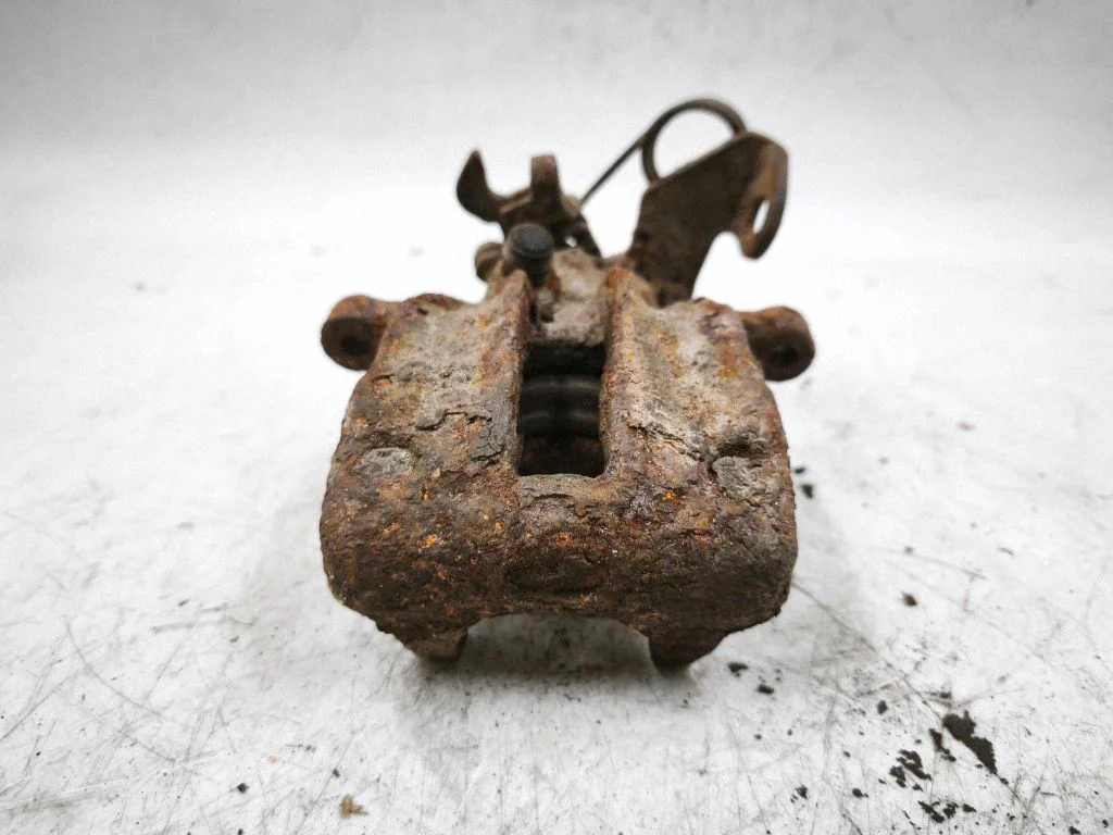 Rear brake caliper – right