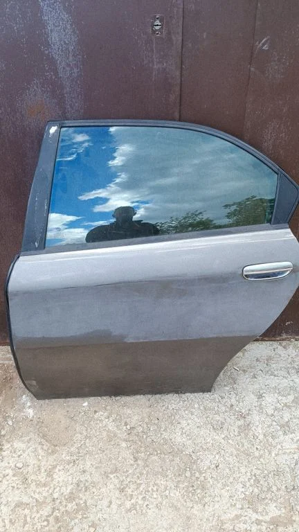 Rear door – left