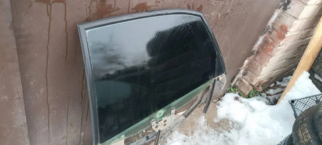 Mechaninis galinio lango pakėlimo mechanizmas