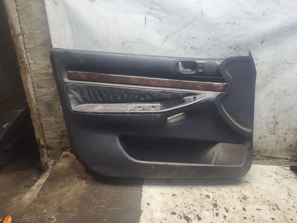 Front door card panel trim – front left
