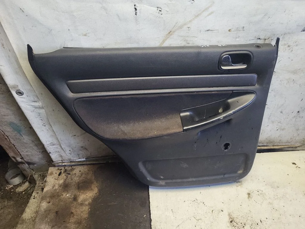 Rear door card panel trim – rear left