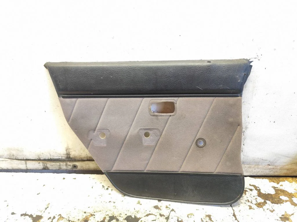 Rear door card panel trim – rear left