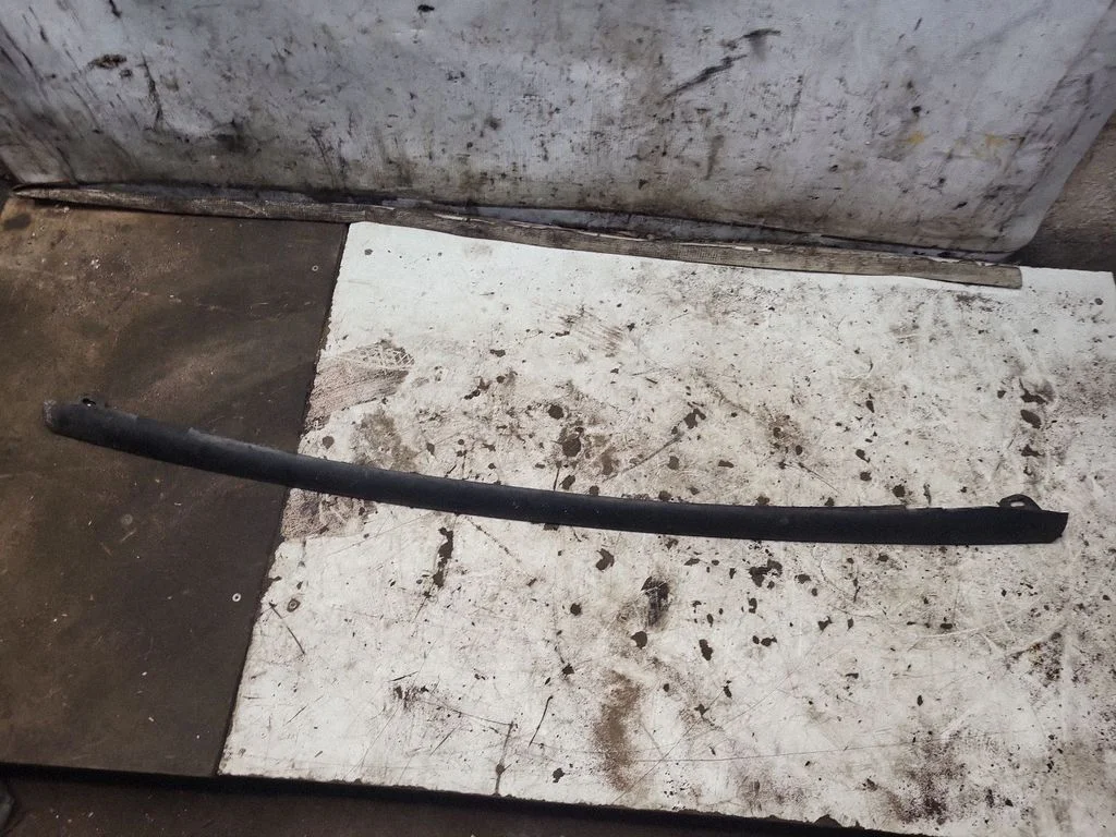 Kita bagažinės apdailos detalė