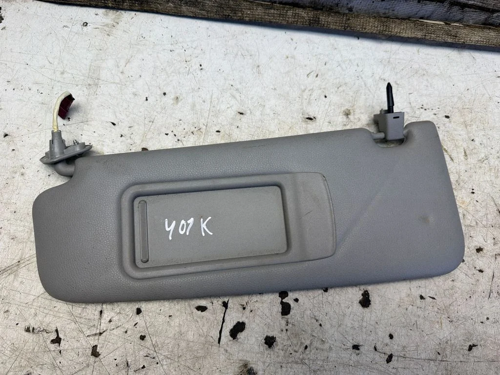 Sun visor – left