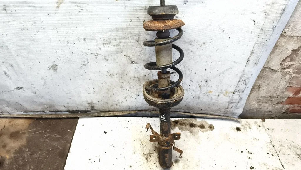 Front shock absorber with coil spring – front right