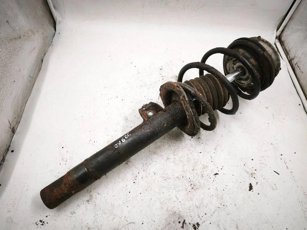 Front shock absorber with coil spring – front right