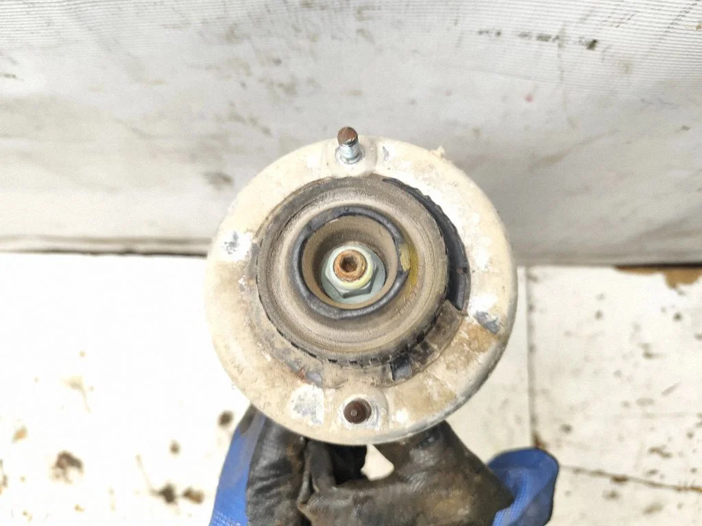 Front shock absorber with coil spring – front right