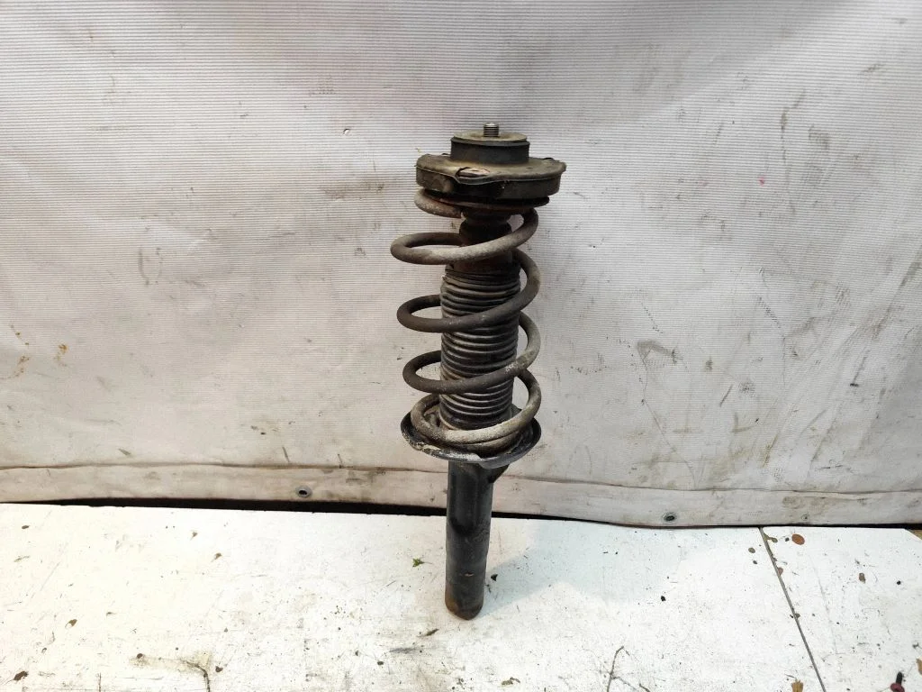 Front shock absorber with coil spring – front right