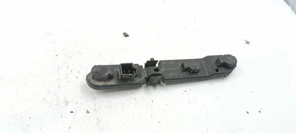 Tail light bulb cover holder – Volvo S60 (2001-2004)