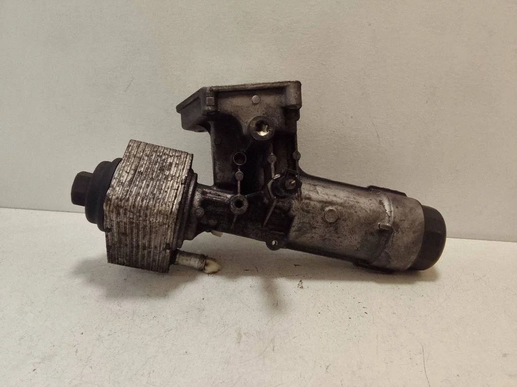 Oil filter mounting bracket 038115389C