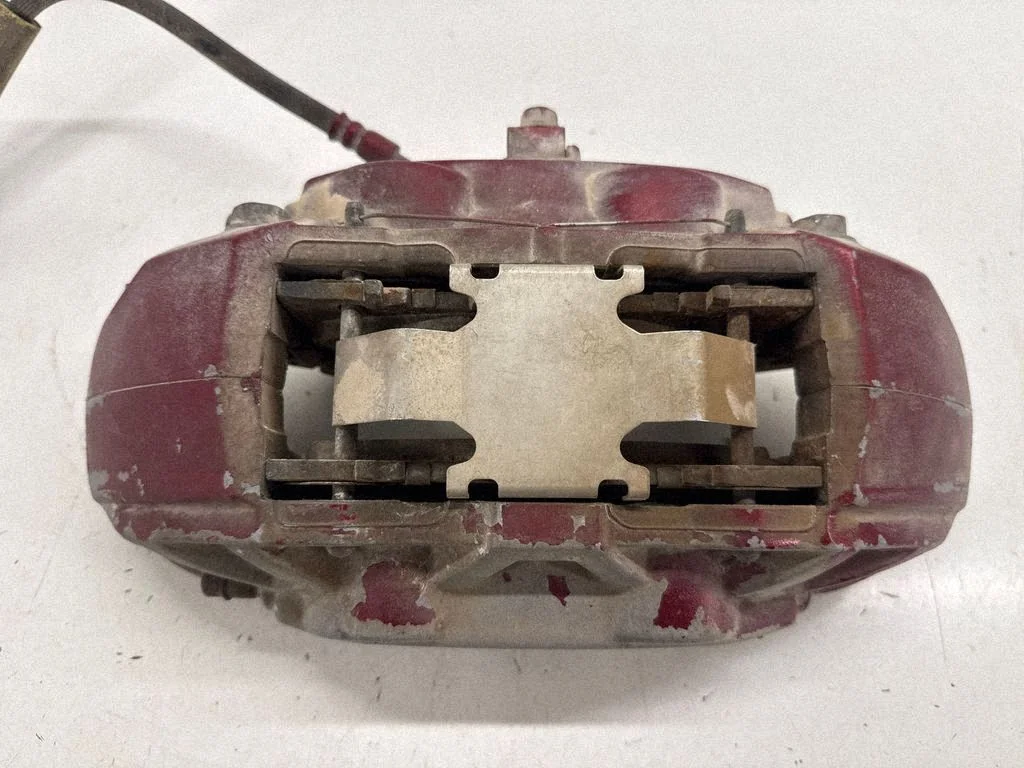 Front brake caliper FR3C2B302CA