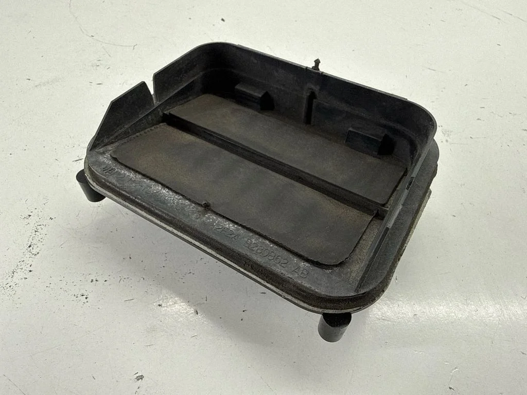 Quarter panel pressure vent 106803400B