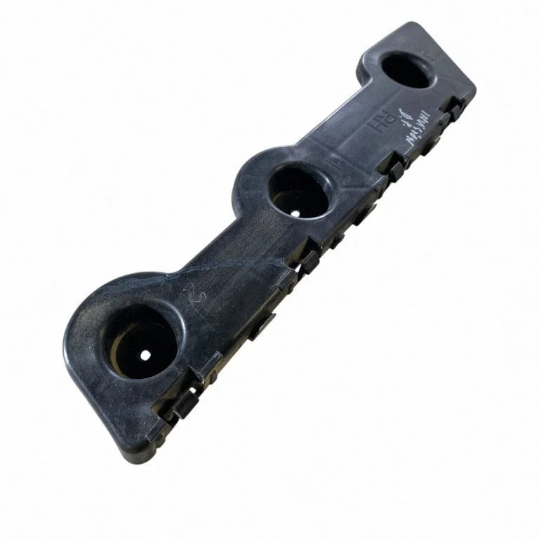 Rear bumper mounting bracket 84869421