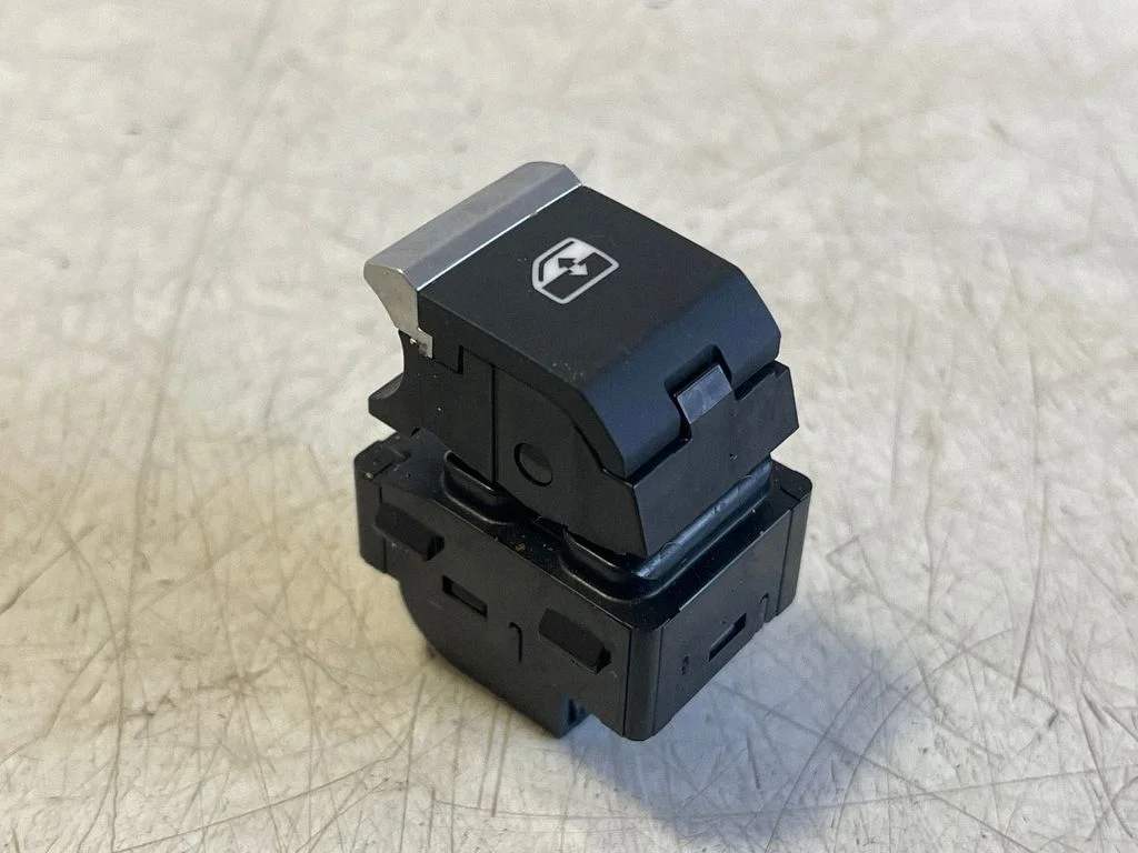 Electric window control switch – rear left