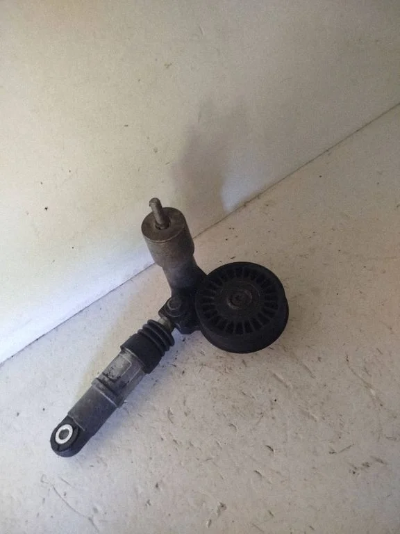 Generator/alternator belt tensioner