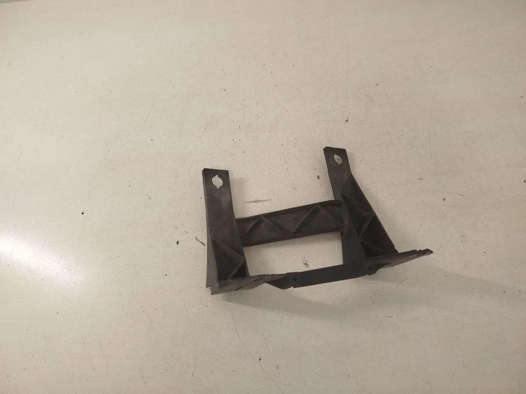 Headlight/headlamp mounting bracket – left