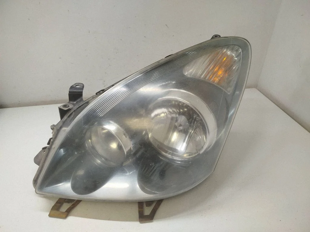 Headlight/headlamp – left