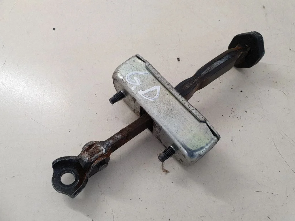 Rear door check strap stopper – right