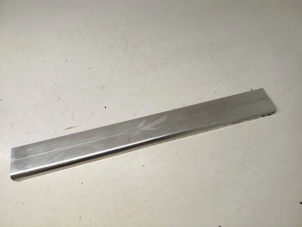 Front sill trim cover
