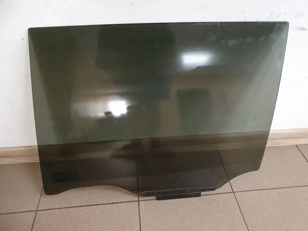 Rear door window glass – left
