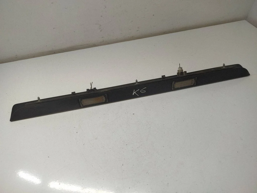 Trunk door license plate light bar 1307272070