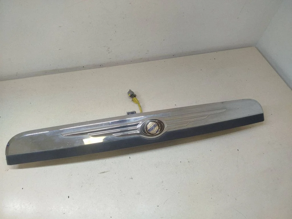 Trunk door license plate light bar 05109538AC