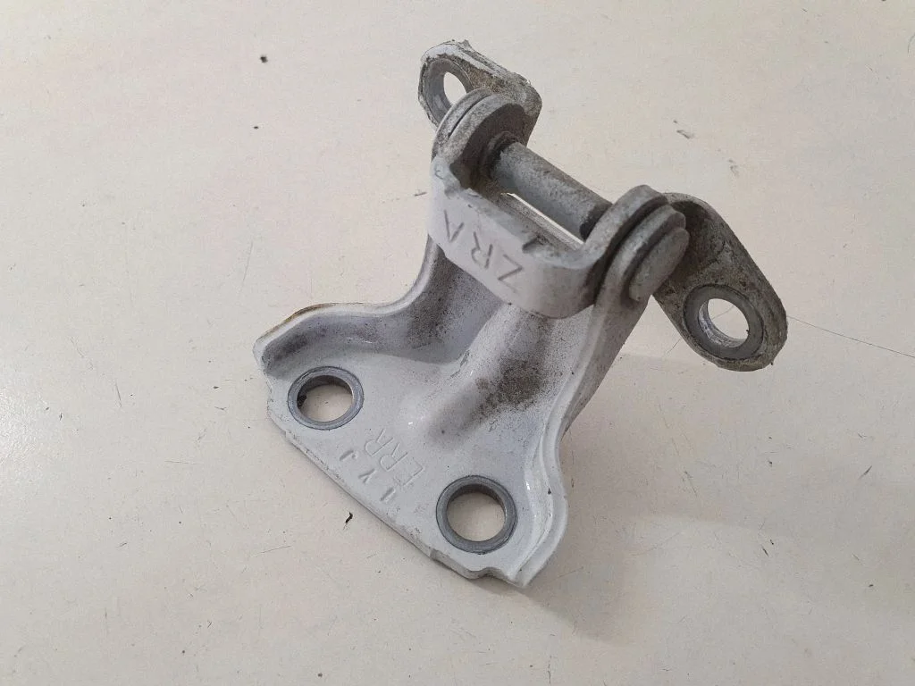 Rear door upper hinge – right