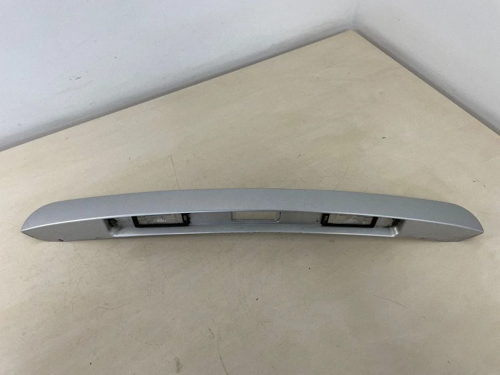 Trunk door license plate light bar 8200883011