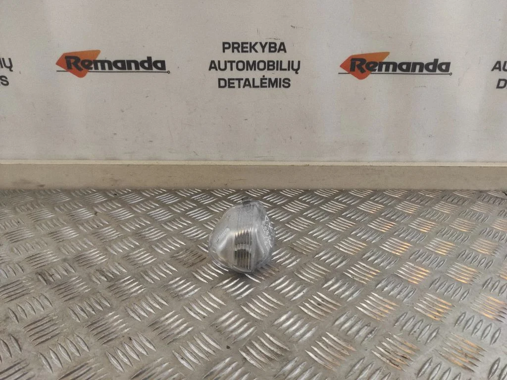 Posūkio žibintas veidrodėlyje