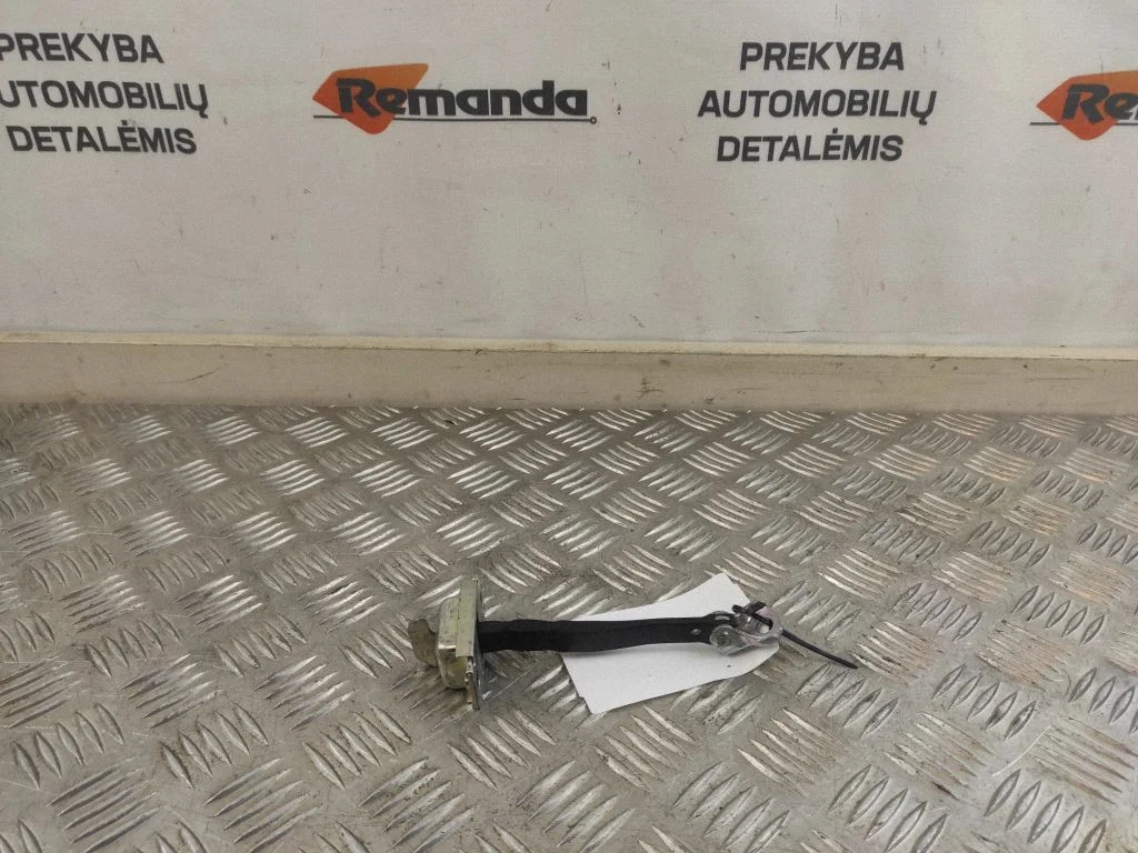 Rear door check strap stopper