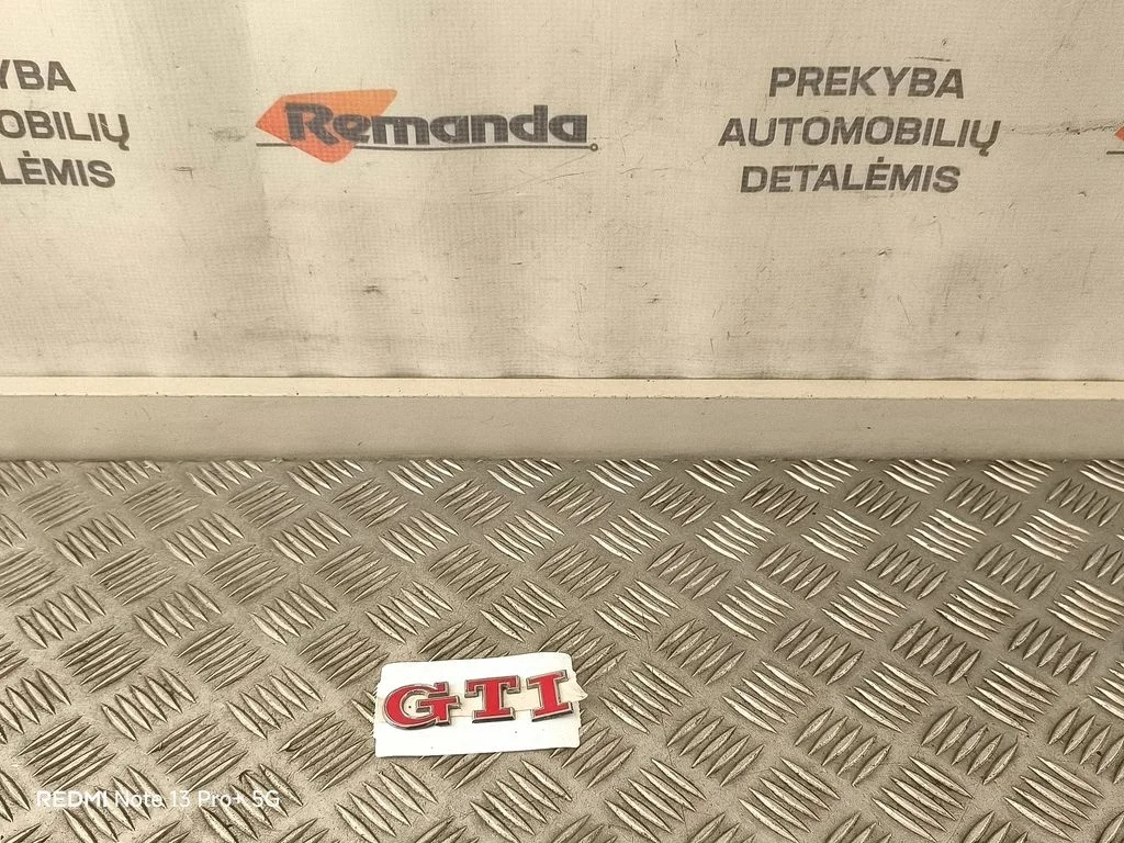 Gamintojo ženkliukas/ modelio raidės