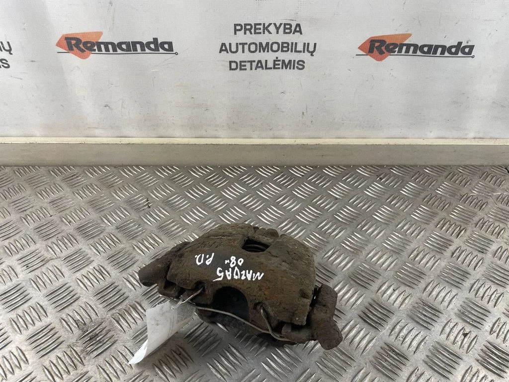 Front brake caliper – front right