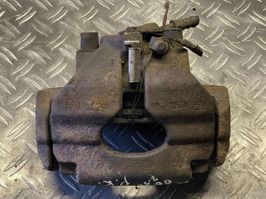 Front brake caliper – front left