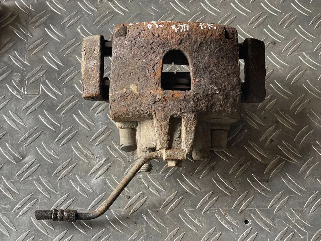 Front brake caliper – front left