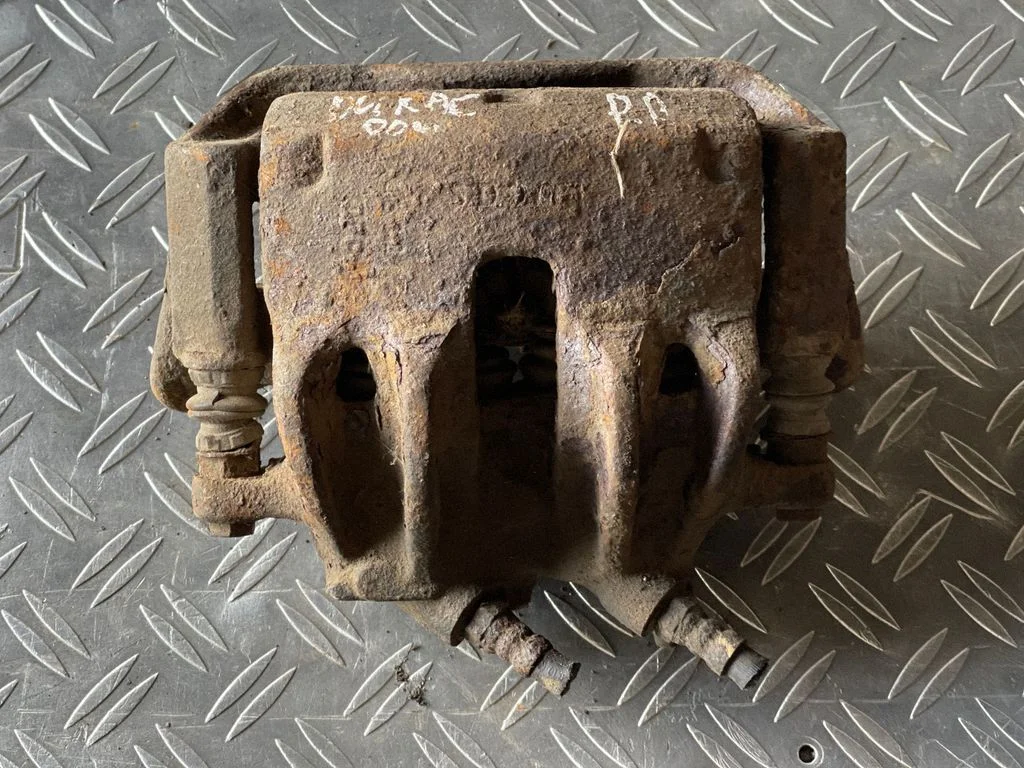 Front brake caliper – front right